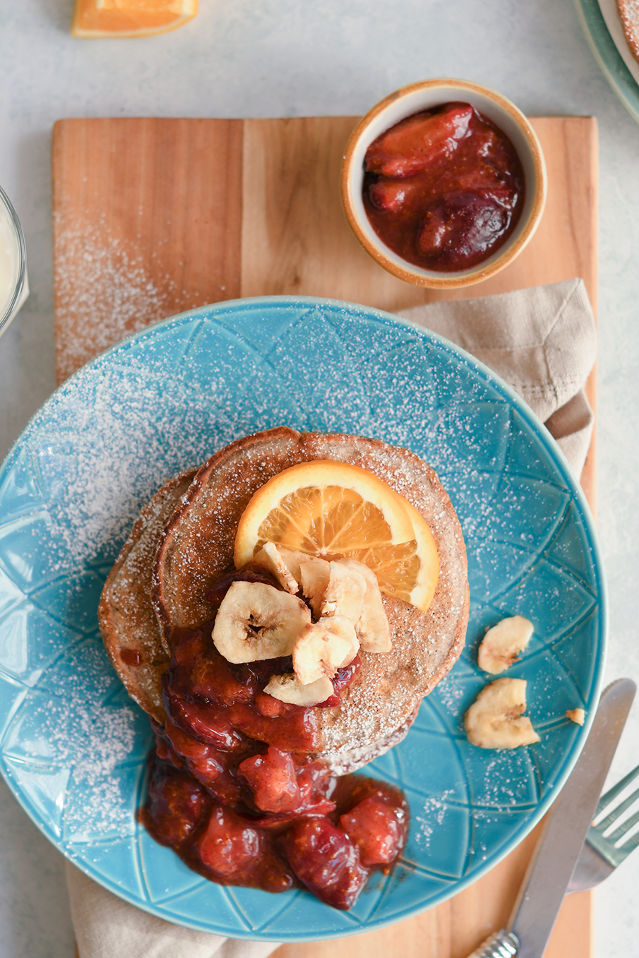 Cinnamon oat and banana pancakes with spiced plums