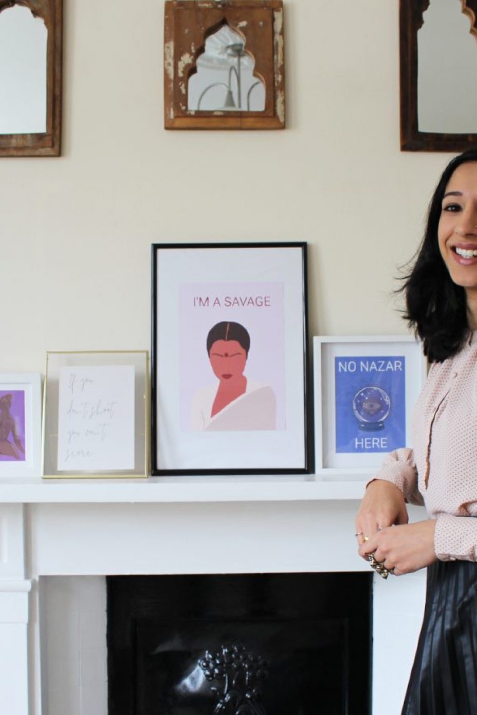 An image promoting Jatinder Creates; the maker is standing next to a selection of her artwork inspired by her South Asian heritage