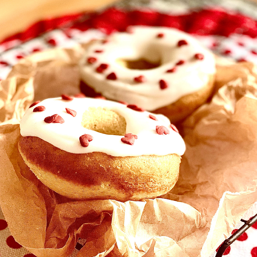 Valentines doughnuts, decorated with water icing and valentines sprinkles